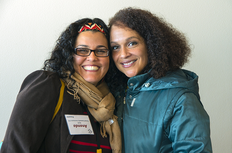 2 women smiling