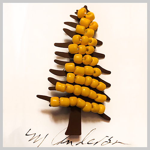 metal tree with yellow beads