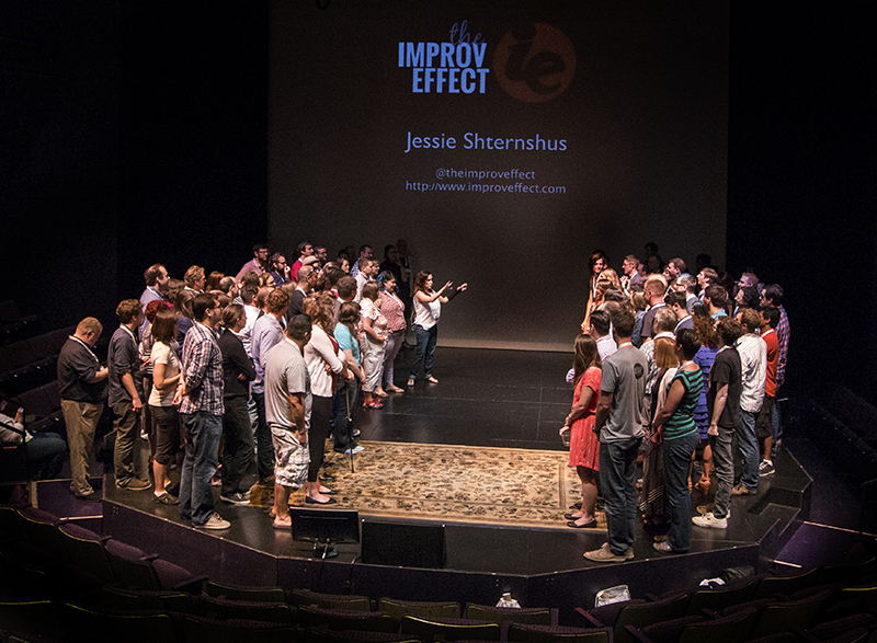 Audience all on stage for an improve excersize